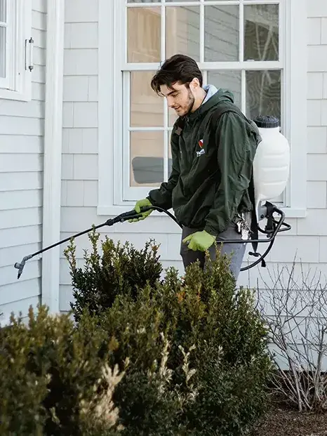 Val-U-Pest technician applying outdoor insect repellant